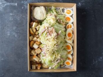 Classic Caesar, Soft Boiled Eggs, Croutons, Crisp Bacon, Parmesan, Whole Egg Mayonnaise (v)